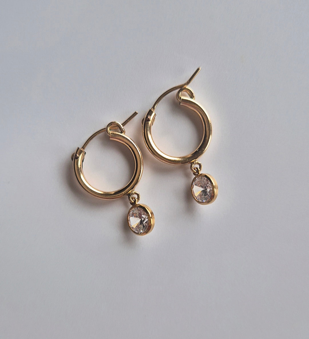 Brilliant white cubic zirconia charm earrings