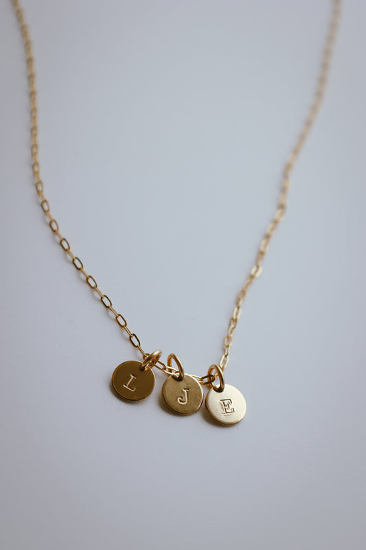 Handstamped initial disc gold-filled 